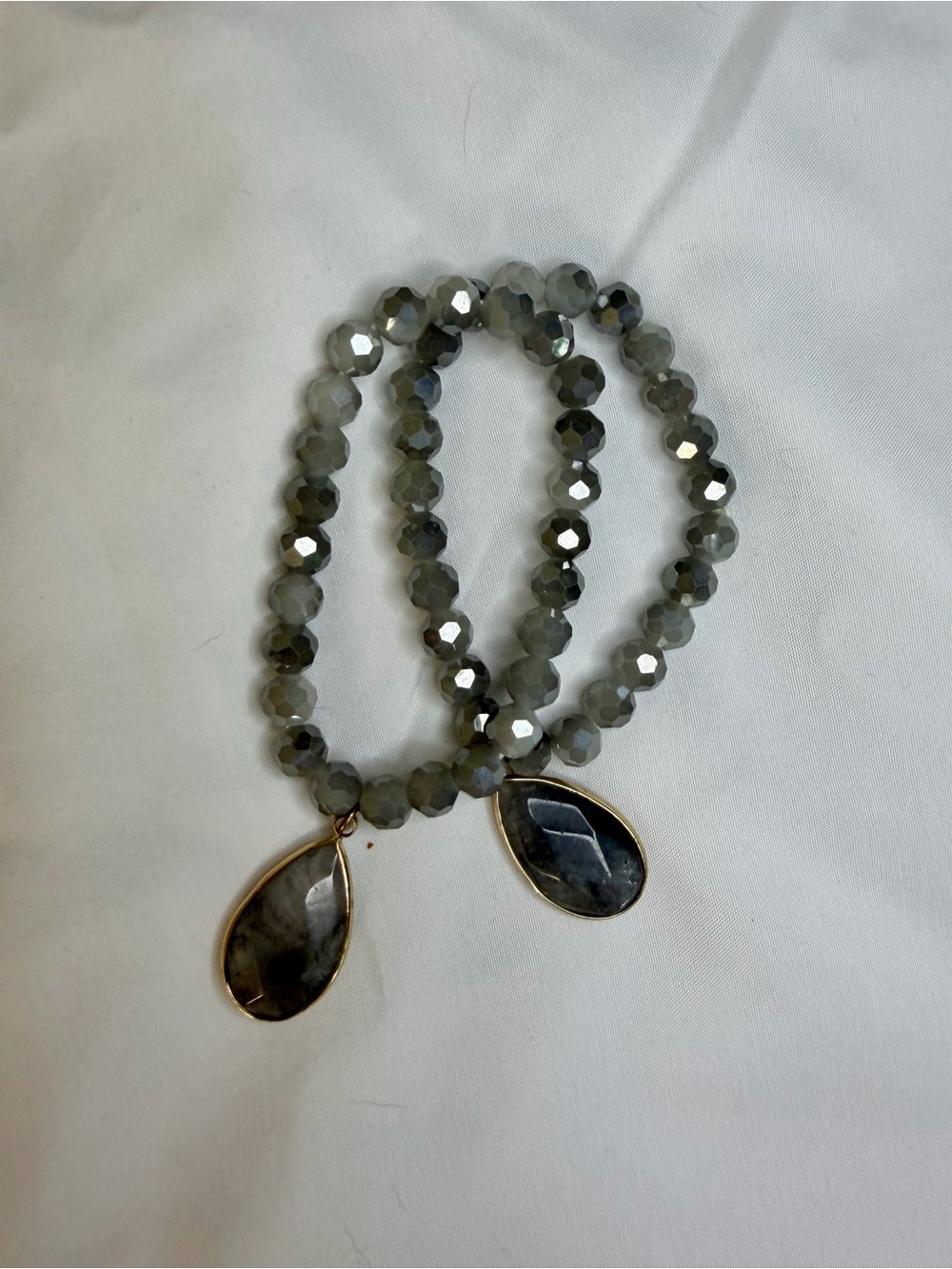 Faceted Gray Bead Stretch Bracelet with Teardrop Pendant